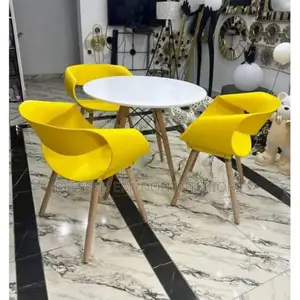 Round Beechwood Dining Table With 3 Yellow Sitting Chairs