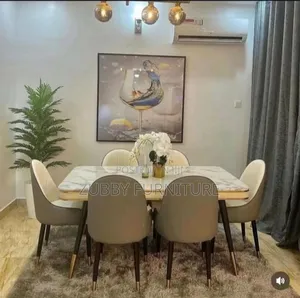 High Quality and Imported Dining Table by 6 Chairs