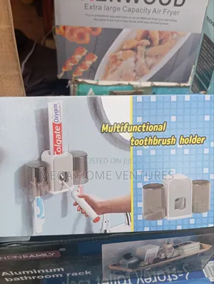 Toothpaste Dispenser With Brush Holder