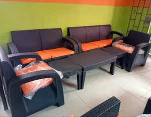 7 Seater Rattan Sofa, Center Table and Stool.