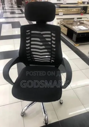 Durable Office Chair Swivel With Headrest for Staff Use.
