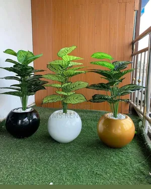 Indoor/Outdoor Fibre Vase and Plant .