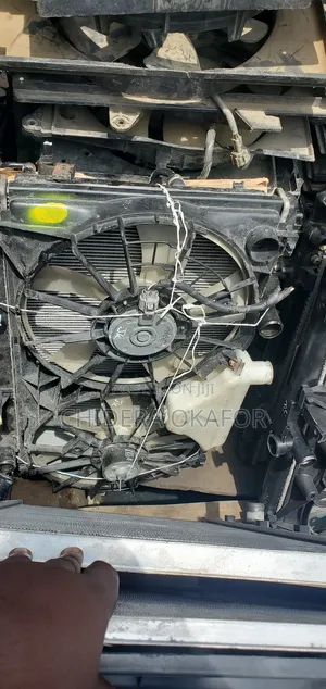Radiator and Fan and Condenser for Is 250. 09