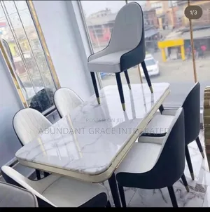 Marble Dinning With 6 Chairs.