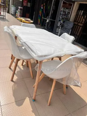 Dinning Table and 4 Seaters.