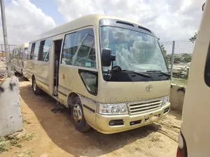 Toyota Coaster 2015 Gold