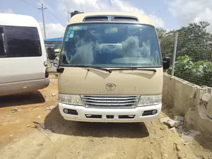 Toyota Coaster 2014 Gold