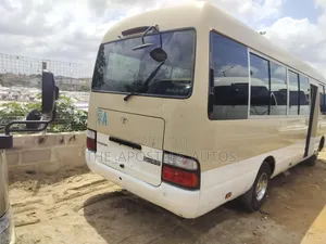 Toyota Coaster 2016 Gold