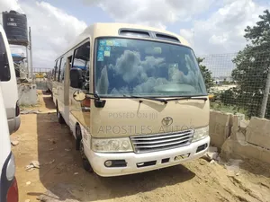 Toyota Coaster 2016 Gold