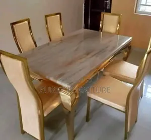 Quality and Imported Marble Top Dining Table by 6 Chairs