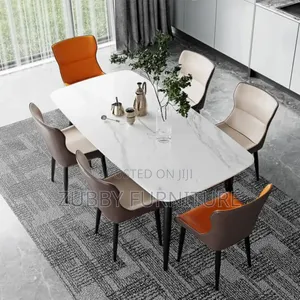 Quality and Imported Marble Top Dining Table by 6 Chairs