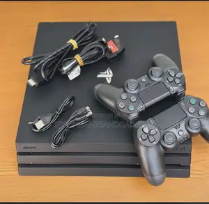 Uk Used Ps 4 Pro 1tb With 2 Pads and 12 Installed Games