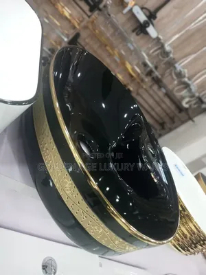 Black and Gold Oval Countertop Basin