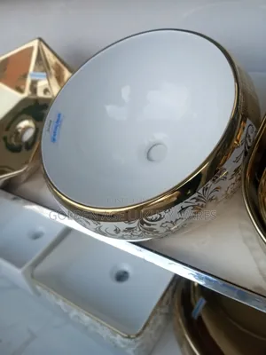 Gold and White Round Countertops Basin
