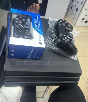 Ps 4 Pro 1tb With 2 Pads and 12 Games and Accessories