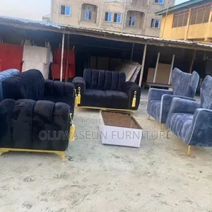 Luxury Set of Chairs With Center Table by Oluwaseun