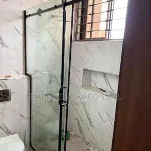 Shower Glass Cubicle With Dark Accessories