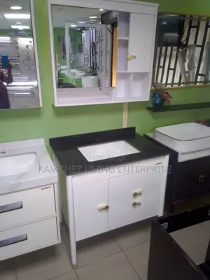 Modern White Sink Vanity With Black Top and Mirror Storage