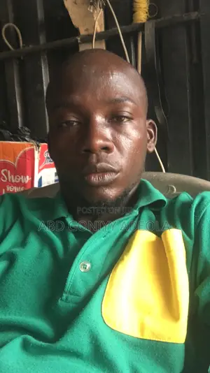An Experienced Worker in a Table Water Factory