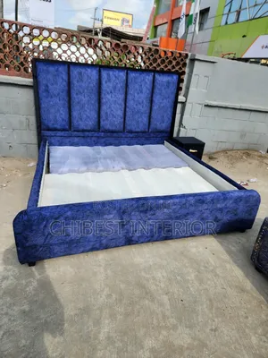 Padded 6by6 Blue Bed With a Black Side Drawer