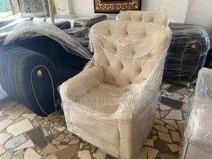Sets of Black and Off-White Sofas