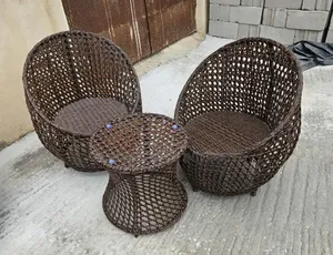 Loveseat Rattan Chair With a Table.