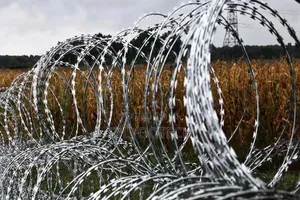 Barb Wire Fence Installation