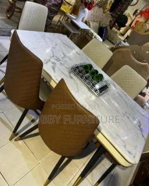 Quality and Imported Marble Top Dining Table by 6 Chairs