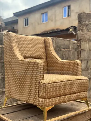 Coffee Brown Arm Chair Up for Grab