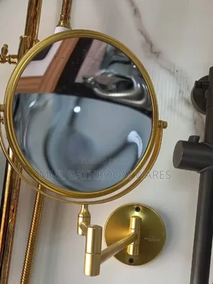 Gold Wall-Mounted Makeup and Magnifying Mirrors