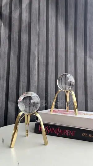 Tripod Figurine With Globe