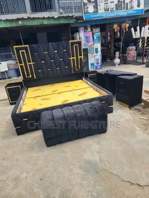 Padded Six by Six Black Bed Frame.