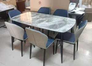 Quality and Imported Marble Top Dining Table by 6 Chairs