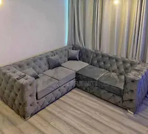 Grey L Shaped Chesterfield Sofa With Pillows