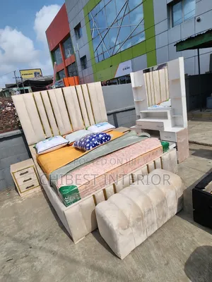 Modernized Bed With Dresser, Drawers and Footrest