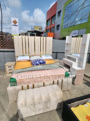 6ft Tall Cream Coloured Upholstery Bed.