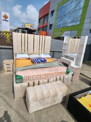 A Set of Six by Six Upholstery Bed.