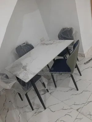 Dinning Table With Four Chairs.