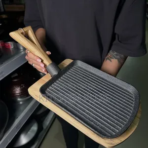 Cast Iron Griddle Pan, Likely for Grilling Food