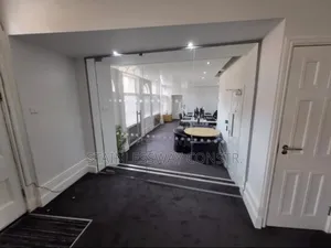 Glass Partition for a Sleek Office Workspace