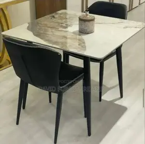 A Set of Dining Set With 2 Chairs