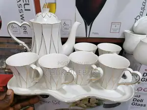 Set of Breakable Tea Cups, Tray and Jug