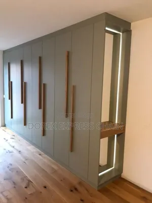 Custom Built-in Wardrobe With Integrated Display Niche.
