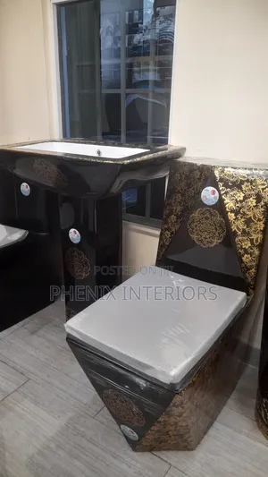 Luxury Toilet Water Closet With Gold Coloured Designs