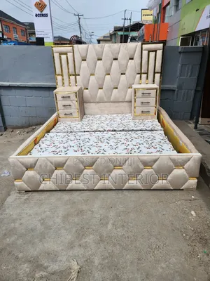 Cream Coloured Padded 6by6 Bed Frame With Side Drawers.