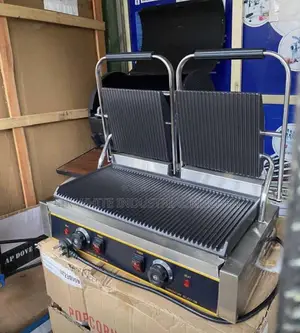 Foreign Shawarma Toaster Also Known as a Commercial Contact Grill