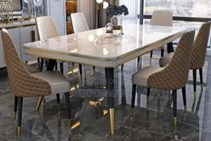 Marble Dining Table and Six Chairs.
