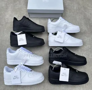 Unisex Black and White Nike Sneakers