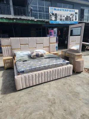 5ft Tall Bed Frame With Its Executive Dresser and Cupboards
