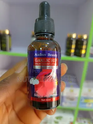 Aichun Beauty Garlic Essential Oil:Hip Butt Enlargement Oil